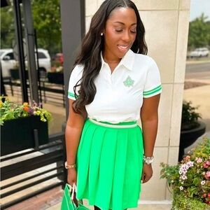 Alpha Kappa Alpha Inc. Polo Shirt & Green Pleated Skirt Set from Ivystorehouse